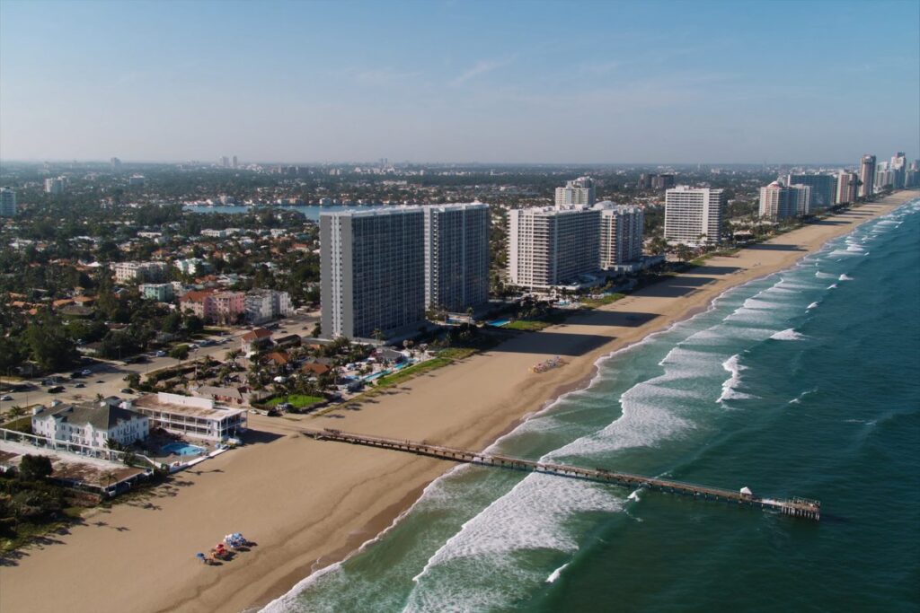 Pompano Beach coastline with beachfront condos and fishing pier